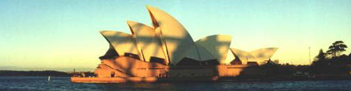 Sydney Opera House shadowed by the Harbour Bridge
